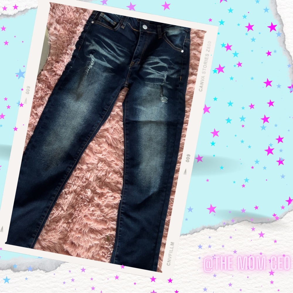 DISTRESSED RIPPED JEANS